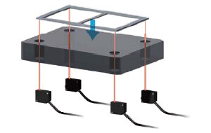 Detection of workpieces through a workbench